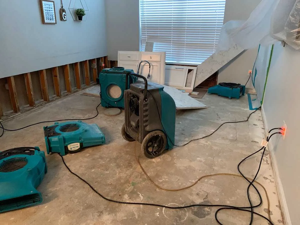 Dehumidifier in flood-cut room for Water Damage Restoration in West Columbia